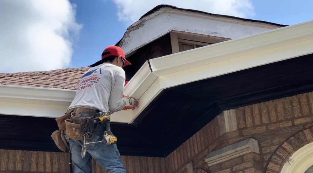 Chicago gutter contractor installing a residential rain gutter system