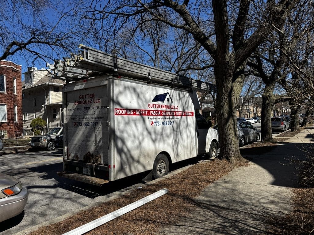 Emergency gutter repair service in Chicago – technicians repairing damaged gutters and downspouts during all seasons.